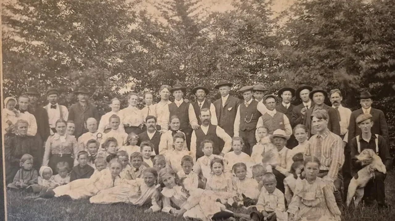 Before — Every face in an old class photo, clear enough to recognize again.